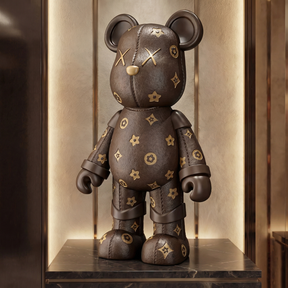 Atelier Home™ The LV Bear™ plush teddy bear with designer-inspired LV pattern and soft fabric, ideal for decorative and cuddly use.