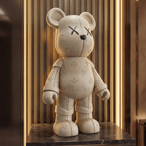 Atelier Home™ The LV Bear™ plush toy featuring a soft, detailed stuffed bear with designer-inspired LV branding on the plush.